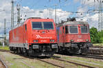 Lok 185 620-1 und die Re 620 060-4 stehen beim Badischen Bahnhof nebeneinander.