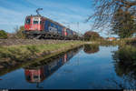 Re 6/6 11651  Dornach-Arlesheim  und eine Re 421 mit einem Kesselwagenzug am 13.