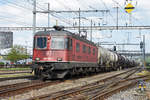 Re 620 030-7 durchfährt den Bahnhof Pratteln. Die Aufnahme stammt vom 24.04.2018.