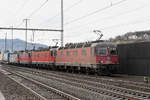 Dreifach Traktion, mit den Loks 620 056-1, 11664, 11341 und der kalten Re 620 069-5, durchfährt den Bahnhof Gelterkinden. Die Aufnahme stammt vom 17.12.2018.
