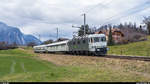 Railadventure Re 6/6 11603 mit zwei Kupplungswagen am 19. Januar 2020 auf dem Weg von Zweisimmen nach Basel bei der ehemaligen Haltestelle Spiezmoos Süd.