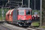 Re 620 075-2  Gelterkinden  mit einem Kieszug bei Mühlau unterwegs in Richtung Rotkreuz, aufgenommen am 04.03.2020.