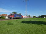 Die Re 620 078 fährt mit einem Kieszug von St.Margerethen nach Hüttwangen-Wil.
