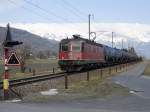 Re 6/6 11618 am 06.03.2012 zwischen Sevelen und Trbbach in Fahrtrichtung Sargans.