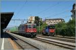 SBB Cargo in Renens VD: Re 620 088-5 und ein Tm 232.
10. Juli 2015