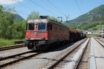 SBB: Güterzug mit Re 6/6 11613  RAPPERSWIL  kurz vor der Abfahrt nach Biel in Reuchenette-Péry am 26.