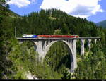 RhB - Regio nach Davos mit der Ge 4/4 649 am Schluss auf dem Viadukt in Wiesen am 30.07.2018