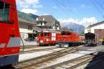 MGB exBVZ - HGe 4/4 I 12 neben Deh 4/4 21 am 22.05.1997 in Visp - Zahnrad-Lokomotive - Baujahr 1930 - SLM3337/SWS/MFO - 736 KW - Gewicht 46,80t - LP 14,10m - zulssige Geschwindigkeit 45/Z25 km/h -