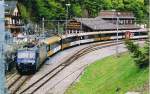 HGe 4/4 II 101 967 mit Golden Pass Panoramic nach Interlaken Ost auf der Brnigpasshhe im Sommer 2005.Hinweis: Gescannzes Foto.