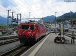 HGe 4/4'' 101 ''Ville de Sion/Sitten'' am 4.8.2012 in Disentis/Mustr mit dem GEX 908. Ab hier wird die Zahnrad betriebene MBG-Lok durch eine Adhsions-Lok der RhB ersetzt.