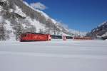 HGe 4/4 II 3 befindet sich am 23.02.2014 in Täsch. Da über den Winter nur ein Zugpaar des Glacier-Express verkehrt, können die übrigen Panoramawagen in den Regionalzügen nach Zermatt eingesetzt werden.