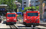 mgb - HGe 4/4 109 mit Galcier Express bei der einfahrt in den Bahnhof neben der HGe 4/4 108 im Bahnhof Brig am 24.05.2026
