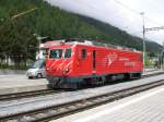 Rh�tische Bahn 2008 - HGe 4/4 107  Grimsel  der MGB (ex FO 107) �bergibt in Disentis ihren Zug an die Kollegin der Rh�tischen Bahn und wartet nun das sie ins Bw einr�cken kann.