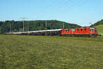 Venice Simplon-Orient Express (VSOE) mit den Re 4/4 ll 11157 und Re 4/4 ll 11196 bei Hermiswil am frühen Morgen des 13.