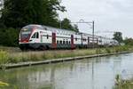 RABe 511 027 als IC von Romanshorn nach Weinfelden (Brig), am 31.7.17 bei der Durchfahrt  bei Bürglen.