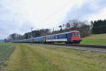 Wegen Bauarbeiten im Heitersbergtunnel werden umlaufbedingt mehr Pendel bentigt. Diese werden mit lterem Rollmaterial gefhrt. Im Bild ist ein EWI/II Pendel mit dem fhrendem BDt EWI 50 85 82-33 976-0 als IR 2118  bei Deitingen, 02.03.2014.

