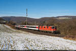Am 21.01.2024 ist SBB Re 420 156-2 unterwegs mit dem Fanzug 27989 von Basel SBB nach Zürich und konnte hier bei Hornussen aufgenommen werden