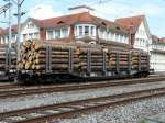 SBB - Holzwagen vom Typ Snps 31 85 472 3 015-7 in Tavannes am 09.09.2012
