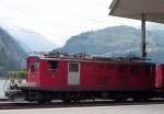 Im Bahnhof Disentis-Mustér ist historisches Lok HGe 4/4 36 der MGB (es steht noch FO auf der lok) gerade angekommen aus die richtung Zermatt-Brig-Andermatt.