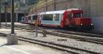 Diesellok Gm 3-3 72 mit den Wagen eines Glacierexpress beim Rangieren in Zermatt.