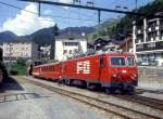 MGB exFO GLACIE-EXPRESS 900 von Brig nach Disentis am 06.06.1993 Einfahrt Disentis mit E-Lok HGe 4/4II 108 - RhB B 2422 - B 4269 - RhB B 2283 - B 4256 - B 4268 - AB 4172.