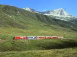 MGB exFO GLACIE-EXPRESS F 901 von Chur nach Zermatt am 24.08.1997 oberhalb Ntschen mit E-Lok HGe 4/4II 108 - RhB WR 3812 - Br 4293 - B 4263 - PS 4011.