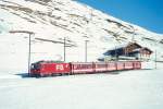 MGB FO-REGIONALZUG 331 von Disentis nach Andermatt am 15.02.1998 etwa 300m unterhalb Ntschen mit Zahnrad-E-Lok HGe 4/4II 108 - B 4267 - B 4266 - ABt 4194 - RhB B 2253 - B 4284 - D 4341.