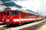 MGB FO-REGIONALZUG 177 von Disentis nach Dieni am 25.06.1994 in Disentis mit  Steuerwagen ABt 4193 - Zahnrad-Triebwagen BDeh 2/4 42  - RhB B 2216.