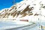 MGB FO-DIENSTZUG 6821 von Oberalppass-Calmot nach Andermatt am 14.02.1998 kurz nach Oberalppass-Calmot mit Zahnrad-Triebwagen Deh 4/4II 96 - B 4272 - B 4253 - ABt 4182.