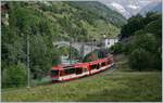 Bei Neubrück und einem Hauch Sonne, fährt der MGB Regionalzug 225 von Visp nach Zermatt.