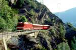 MGB BVZ SCHNELLZUG 103 von Brig nach Zermatt am 10.06.1995 auf Faulkinn-Brcke I mit Zahnrad-E-Lok HGe 4/4II 5 - B 2270 - RhB A - B 2270 - ...