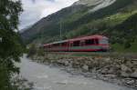 Wenig spter liess mich dann die Sonne leider im Stich und verschwand hinter einer Wolke. Das erste Schattenbild zeigt die beiden Zermatt-Shuttlezge BDSeh 4/8 2054 und 2053 ausgangs Tsch. (12.6.11).