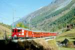 MGB BVZ REGIONALZUG 139 von Brig nach Zermatt am 12.10.1996 zwischen Tsch und Zermatt auf der Tschsandbrcke mit Zahnrad-Gepcktriebwagen Deh 4/4 24 - A 2073 - B 2290 - B 2291 - Bt 2253. Hinweis: Fahrzeuge noch in alter Lackierung
