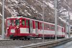 Der Pendelzug  Visp  ist nun auf dem Weg zurck nach Zermatt (15.3.2010), hier bei der Ausfahrt aus dem Bahnhof Tsch.