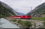 Am 31. Juli 2015 verkehrten zwei nicht mit KOMETen geführte Pendelzüge nach Zermatt. Einer davon war mit dem ex-BVZ Deh 4/4 21 bespannt, der mit seinem Zug hier kurz vor Täsch in Richtung Visp unterwegs ist.