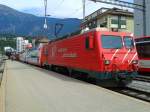 HGe 4/4  Matterhorn  mit GEX 903  GLACIER EXPRESS  (St. Moritz-Disentis/Mustér- Zermatt) am 22.7.2015 beim Halt in Brig Bahnhofplatz.