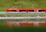 Verw�ssertes Spiegelbild des Regio R45 am Oberalpsee, 7.8.2026