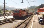 HGe 4/4 105 der FO mit dem Glacier Express bei der einfahrt in Disentis Juni 1996