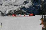 Nochmals GEX 908 mit HGe 107, diesmal wenige Meter unterhalb der Station Ntschen. 13.1.2007. 