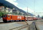 MGB exFO GLACIE-EXPRESS F 901 von Chur nach Zermatt am 01.06.1993 in Disentis mit E-Lok HGe 4/4II 101 - B 4263 - RhB B 2423 - RhB WR 3815 - B 4265 - BVZ A 2072 - B 4264. Hinweis: Bahnhofsanlage noch vor Umbau!
