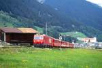 MGB FO-GLACIER-EXPRESS I 905 von St.Moritz nach Zermatt am 28.05.1992 bei Acla mit FO-Zahnrad-E-Lok HGe 4/4II 106 - RhB AB - FO AB - FO A - RhB B - RhB B. Hinweis: Zug verkehrte bis 22.05.1993. FO-Fahrzeuge noch in alter Lackierung. Rechts unten erkennt man das Kloster Disentis.

