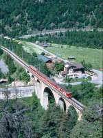 MGB FO-REGIONALZUG 227 von Gschenen nach Brig am 23.05.1993 bei Grengiols auf Rhone-Viadukt mit ABt - B - B - Zahnradtriebwagen Deh 4/4II 94 schiebend.