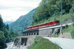 MGB FO-REGIONALZUG 646 von Brig nach Oberwald am 23.05.1993 bei Mrel mit Zahnrad-Triebwagen Deh 4/4I 54  - B 4277 - B 4278 - ABt 4154. Hinweis: Fahrzeuge noch in alter Lackierung
