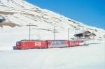 MGB FO-GLACIER-EXPRESS 903 von St.Moritz nach Zermatt am 15.02.1992 etwa 300m unterhalb Ntschen mit FO-Zahnrad-E-Lok HGe 4/4II 101 - BVZ AS 2011 - RhB B 2423 - FO AS 4021 - RhB WR 3815.