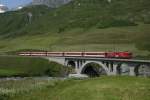 Das letzte Bild aus Hospental zeigt schliesslich den Deh 4/4 II 96, welcher mit einem Regionalzug nach G�schenen die Furkareuss �berquert (13.07.2013).