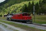 HGe 4/4 15 erreicht wenige Minuten nach dem Dampfzug ebenfalls Reckingen (30.06.2014).