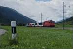 Der Glacier Express 904 kurz vor Oberwald im hier breiten Tal des Goms. 
16. Aug. 2014