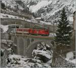 Ein MGB Regionalzug erreicht, von Andermatt kommend, Göschenen. 
24. Jan. 2014 