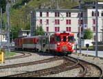 MGB - Einfahrender Regio im Bhf. Andermatt von Göschenen an der Spitze der Steurwagen ABt 4157 unterwegs am 23.07.2023