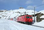 101 passes Oberalppass whilst working the Glacier Express,  2 Feb 2016